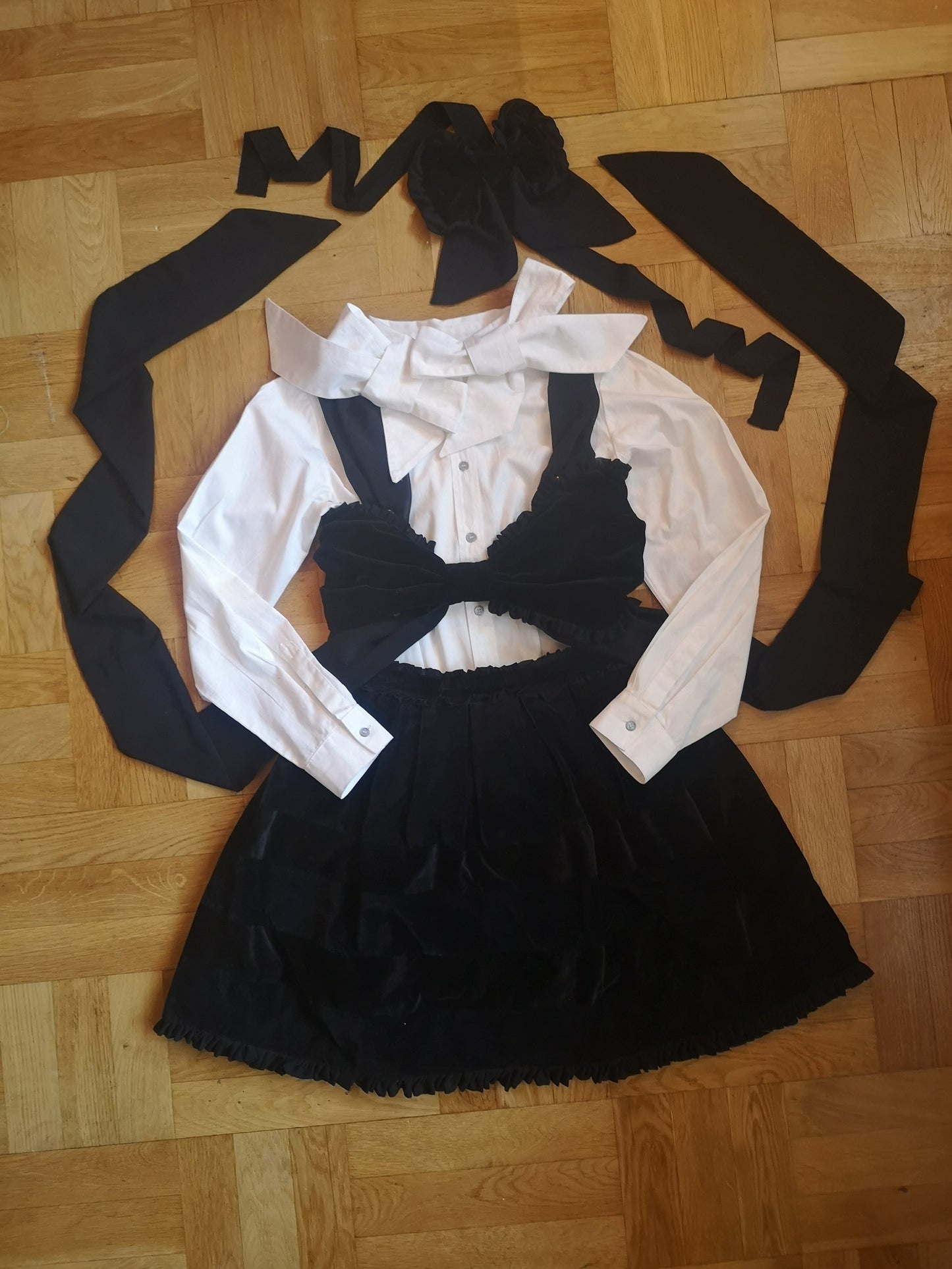 Velvet bow top outfit example with velvet lemur skirt and white shirt. 